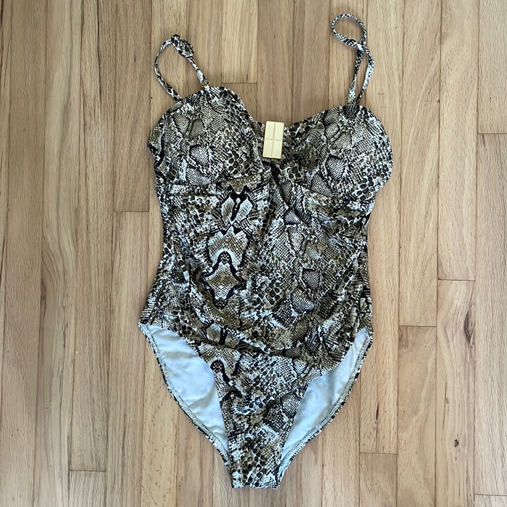 One piece lizard with gold detail bathing suit. Padding included. NWT size 10
